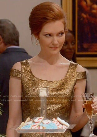 Abby's gold dress with shoulder cutouts on Scandal