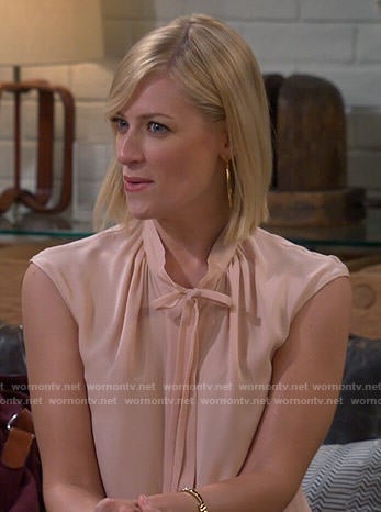 Caroline's blush tie-neck blouse on 2 Broke Girls