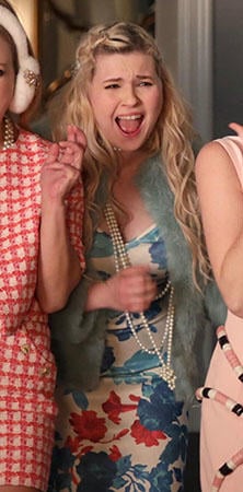 Chanel 5's blue and red floral dress and mint fur jacket on Scream Queens