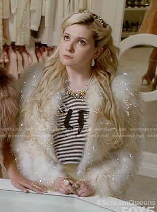 Chanel 5's SELFIE top and gold and white fur jacket on Scream Queens