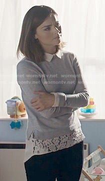Clara's white lace shirt and grey sweater on Doctor Who