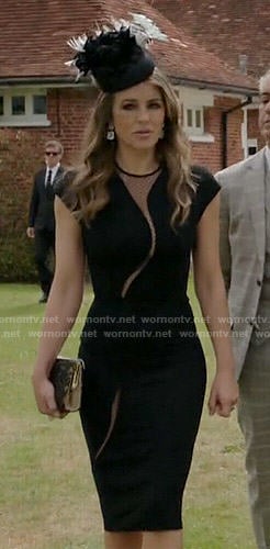 Queen Helena's black dress with polka dot mesh inset on The Royals
