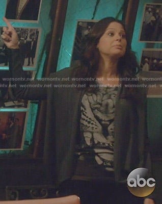 Quinn's tiger graphic tee and leather sleeved cardigan on Scandal