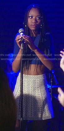 Tamra's blue crop top and white patterned skirt on The Mindy Project