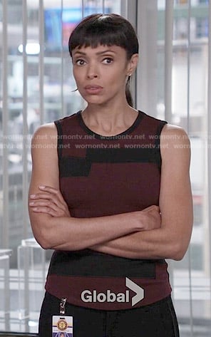 Camille's burgundy top with black strips on Bones
