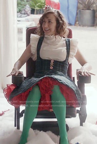 Carol's green plaid jumper dress and white ruffled to on Last Man on Earth