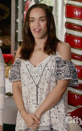Erica's white and navy printed cold shoulder dress on Last Man on Earth