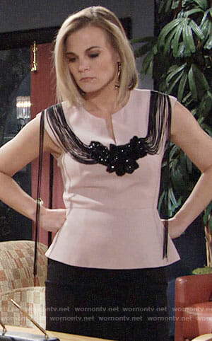 Phyllis's pink peplum top with fringed back on The Young and the Restless