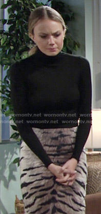 Abby's tiger stripe print skirt and black turtleneck on The Young and the Restless