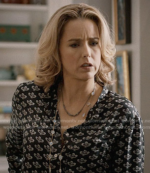 Elizabeth's black flower printed blouse on Madam Secretary