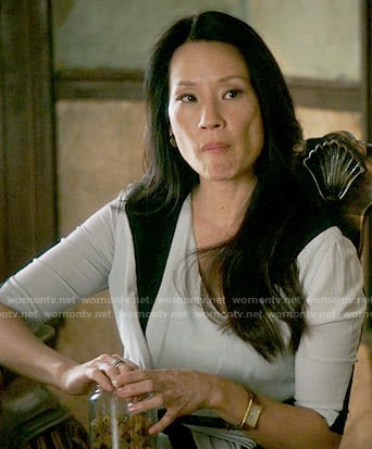Joan's draped two-tone dress on Elementary