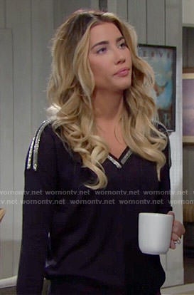 Steffy's black v-neck sweater with silver trim on The Bold and the Beautiful