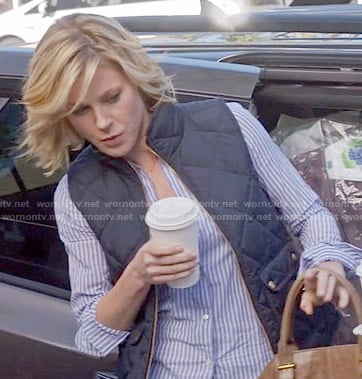 Claire's blue striped shirt and navy quilted vest on Modern Family