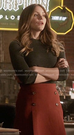 Paige's orange button front skirt on Scorpion