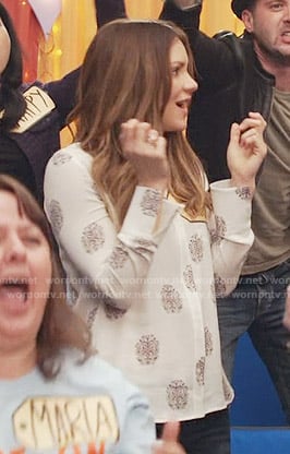 Paige's white printed blouse on Scorpion
