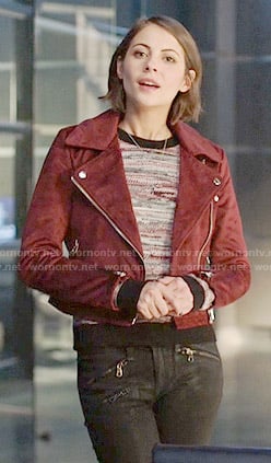 Thea's marled sweater and red suede moto jacket on Arrow