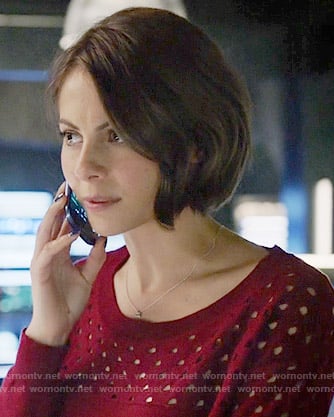 Thea's red perforated sweater on Arrow