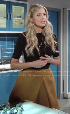 Abby's mustard yellow pleated skirt on The Young and the Restless