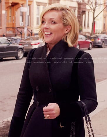 Jacqueline's navy and black coat on Unbreakable Kimmy Schmidt