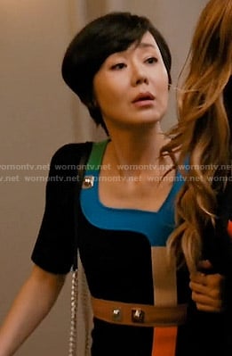 Karen's black dress with multi colored trim on Mistresses