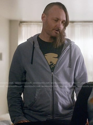 Tandy's ship graphic tee and blue hoodie on Last Man on Earth