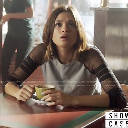 Heather's grey top with dotted mesh sleeves on Beauty and the Beast