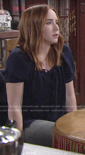 Mariah's navy short sleeve top on The Young and the Restless