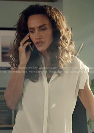 Tess's white sleeveless shirt on Beauty and the Beast