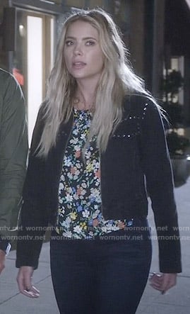 Hanna's floral top and studded black jacket on Pretty Little Liars