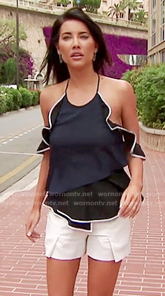 Steffy's navy ruffled open shoulder top and white shorts on The Bold and the Beautiful
