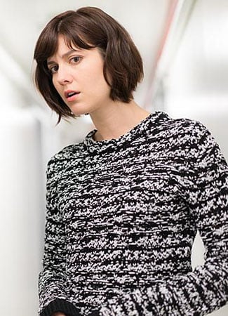 Laurel's black and white knit sweater on BrainDead