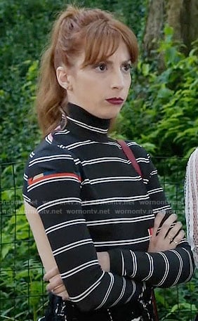Lauren's black striped long sleeve top with cutout back on Younger