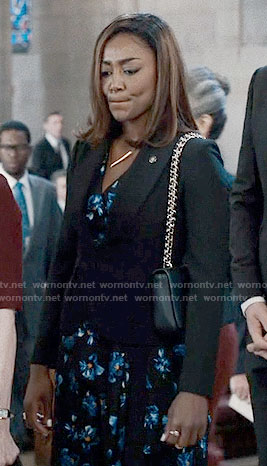 Daisy's black and blue floral dress on Madam Secretary