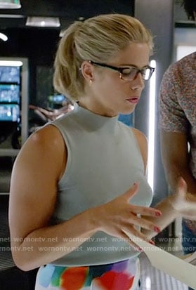 Felicity's blue sleeveless mock neck top on Arrow