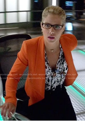 Felicity's floral top and orange jacket on Arrow