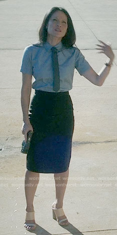 Joan's blue short sleeved shirt and tie on Elementary