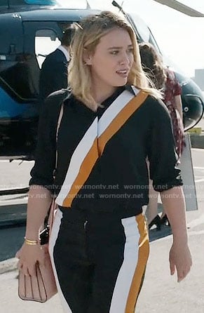 Kelsey's black shirt and pants with diagonal stripes on Younger
