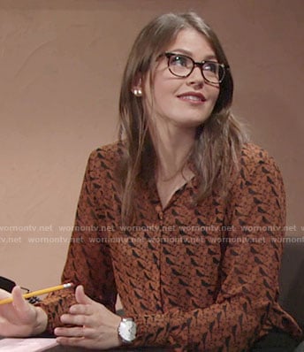 Natalie's orange bird print shirt on The Young and the Restless