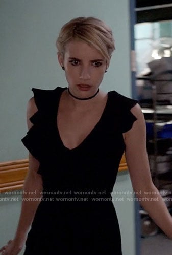 Chanel's black ruffled jumpsuit on Scream Queens