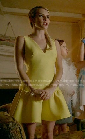 Chanel's yellow drop waist dress on Scream Queens