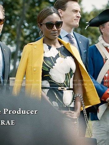 Daisy's tulip print dress and yellow jacket on Madam Secretary