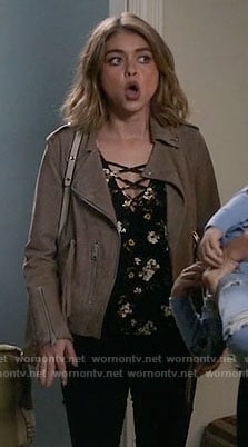 Haley's floral cross strap top and suede jacket on Modern Family