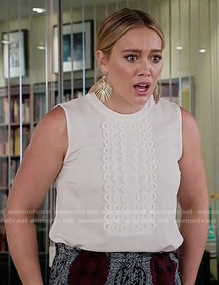 Kelsey's white scalloped front top on Younger