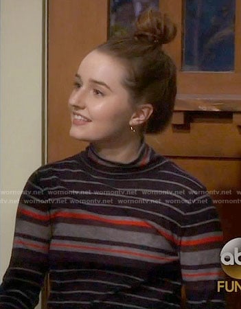 Eve's black striped turtleneck sweater on Last Man Standing