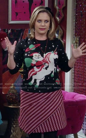 Kimmy's Santa riding a unicorn sweater and pink diagonal stripe skirt on Fuller House
