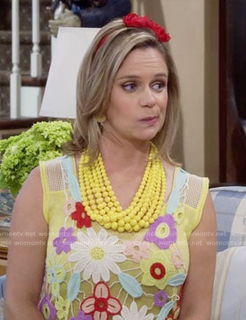 Kimmy's floral crochet top and yellow layered bead necklace on Fuller House