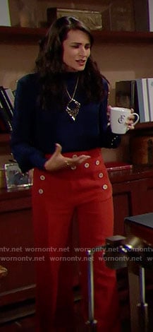 Quinn's blue studded blouse, orange trousers with buttons and leopard print necklace on The Bold and the Beautiful