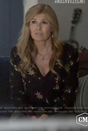 Rayna's black floral long sleeved blouse on Nashville
