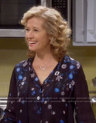 Vanessa's black and blue floral blouse on Last Man Standing