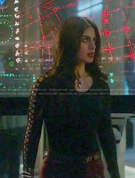 Isabelle's black top with lace up sleeves on Shadowhunters